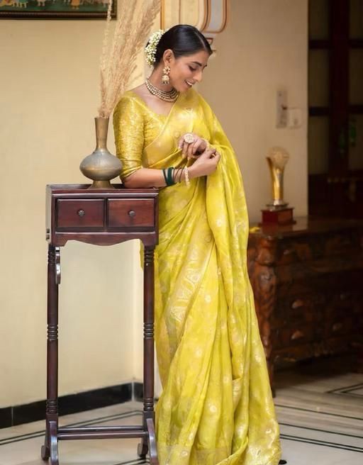 Exuberant Yellow Soft Silk Saree With Prettiest Blouse Piece