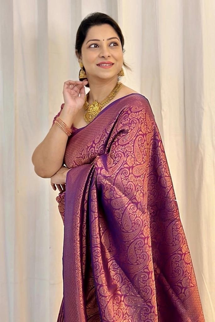 Bewitching Purple Color Soft Banarasi Silk Saree With Blouse Piece