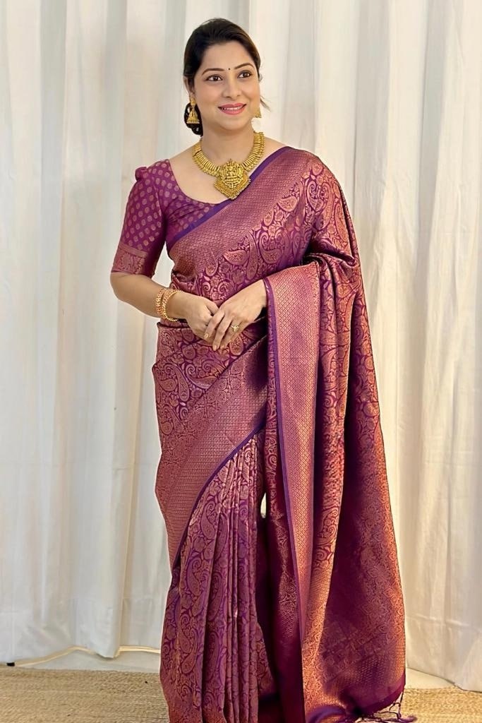 Bewitching Purple Color Soft Banarasi Silk Saree With Blouse Piece