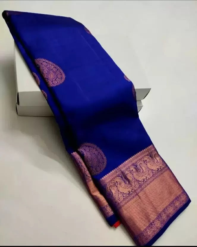 Symmetrical Blue Color Soft Banarasi Silk Saree With Tempting Blouse Piece
