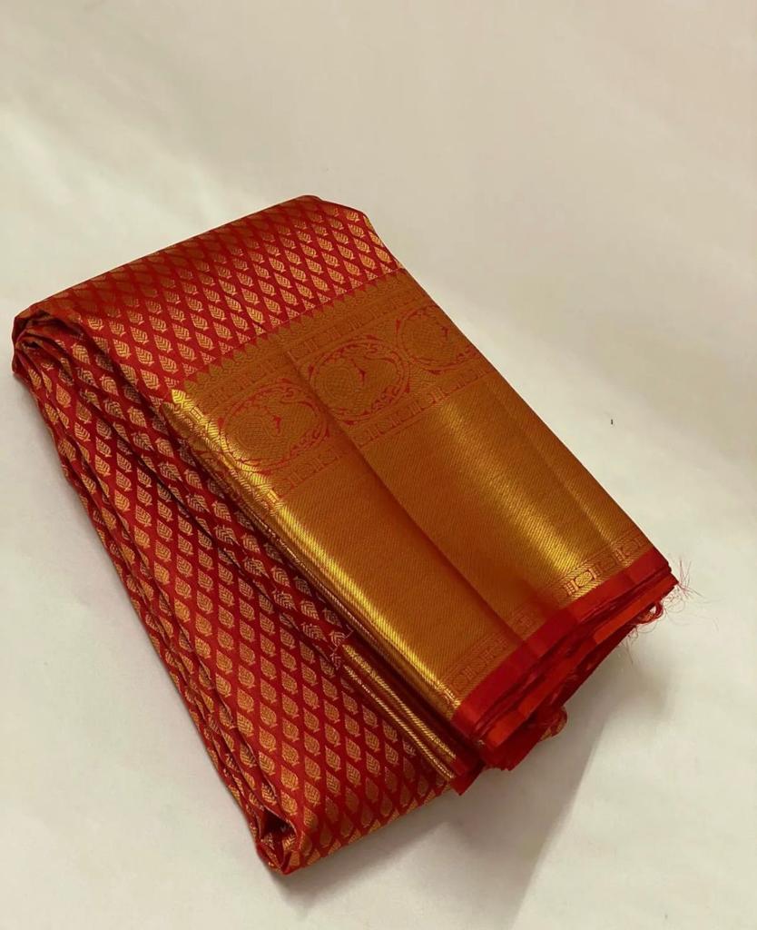 A Glam Red Soft Banarasi Silk Saree With Evocative Blouse Piece