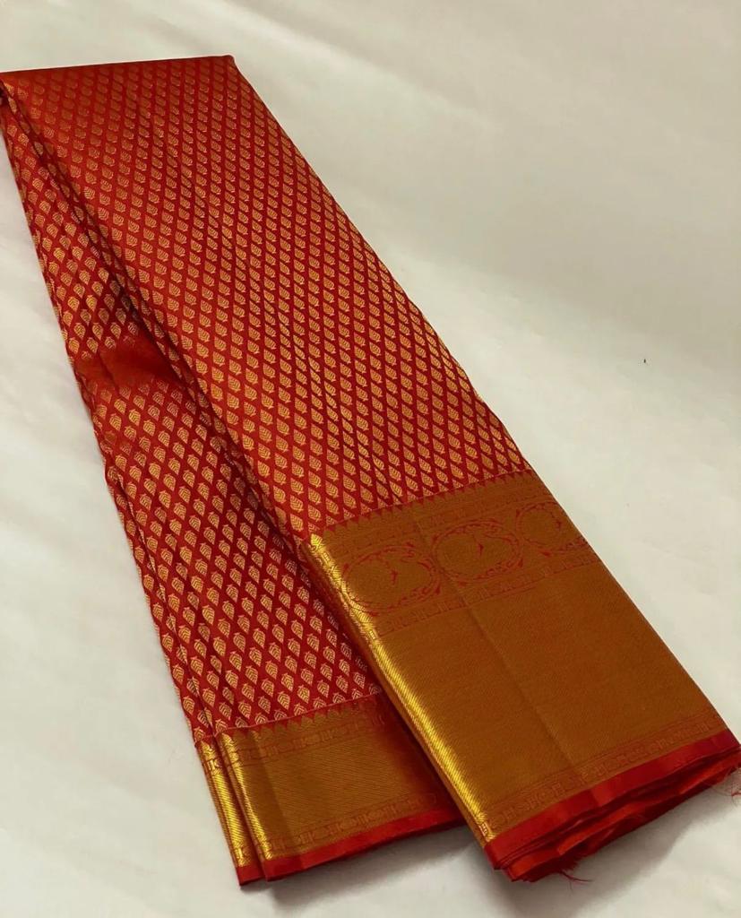 A Glam Red Soft Banarasi Silk Saree With Evocative Blouse Piece