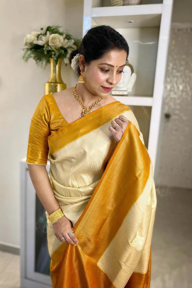 Classy Cream Color Soft Banarasi Silk Saree With Blouse Piece