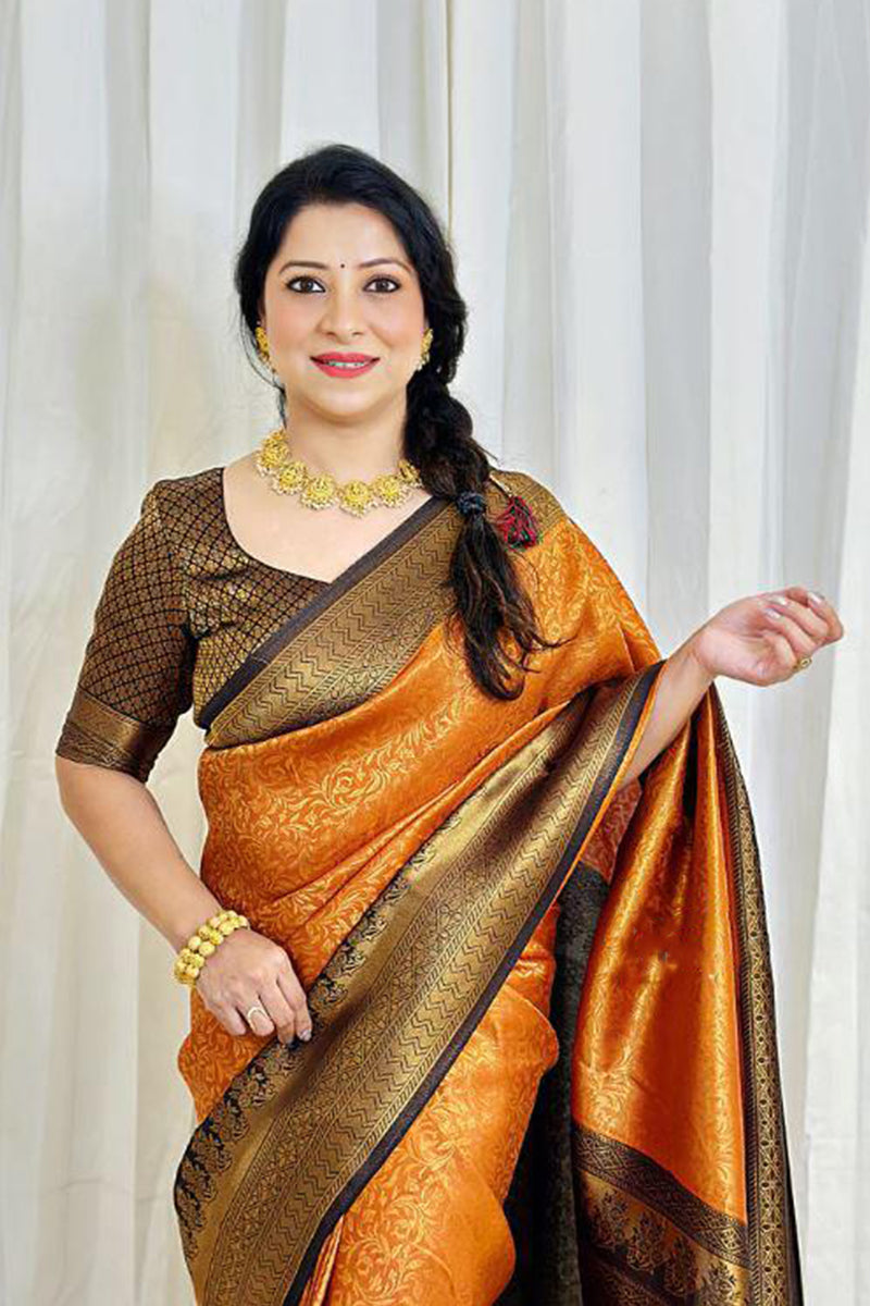 Desuetude Orange Soft Banarasi Silk Saree With Blouse Piece