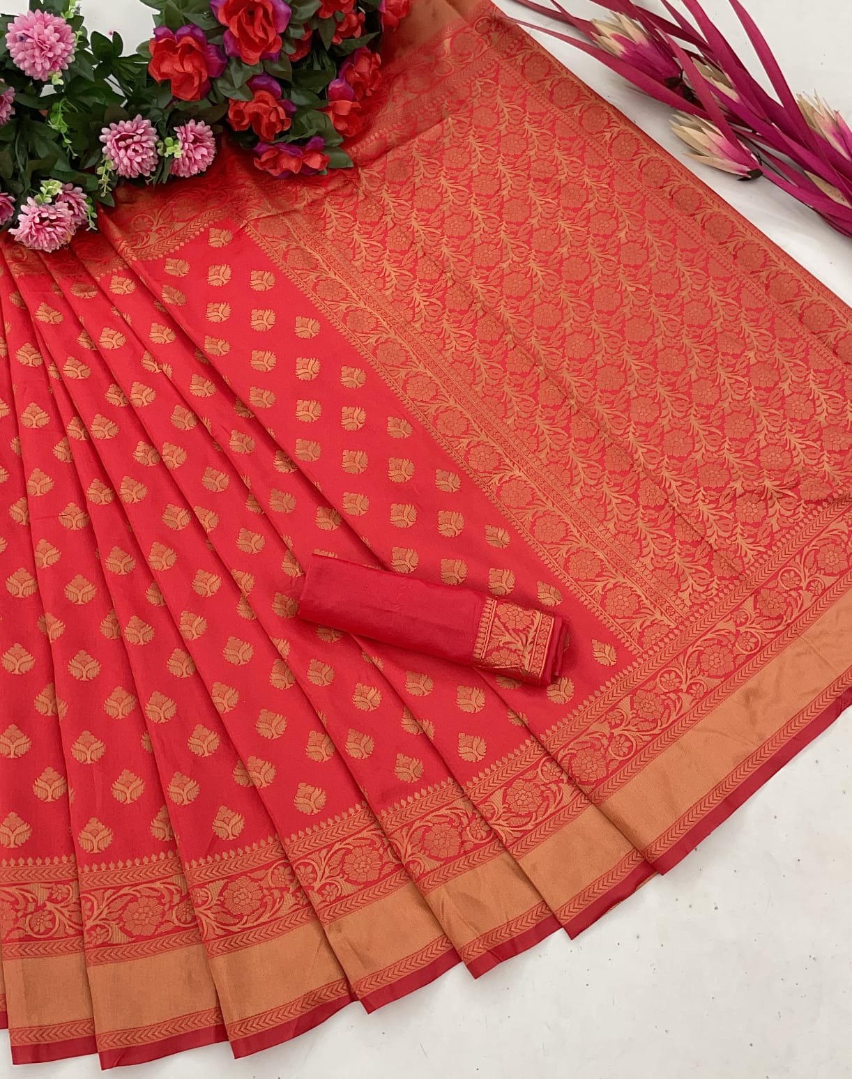 Cynosure Red Color Soft Silk Saree With Opulent Blouse Piece