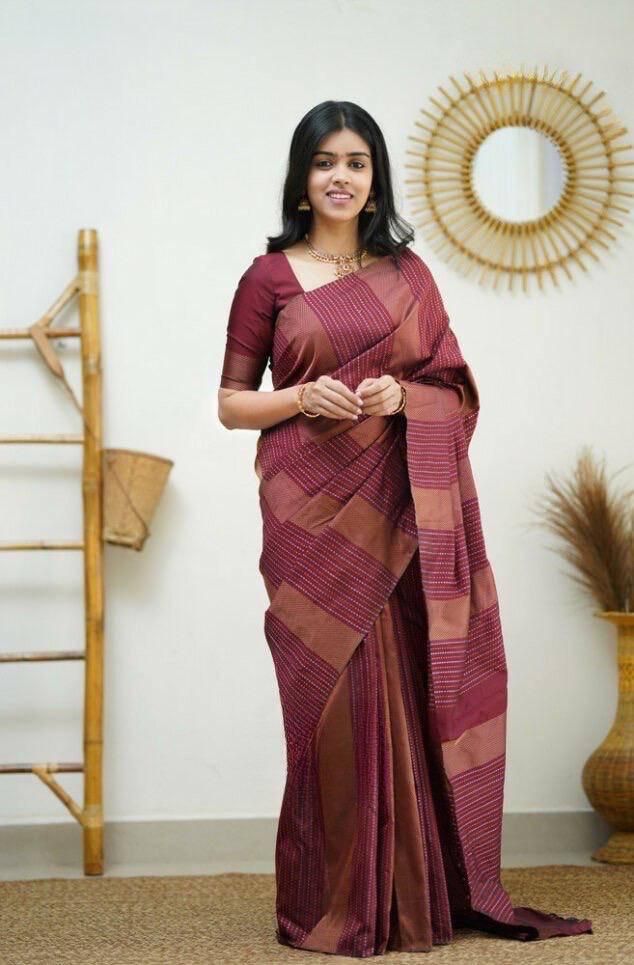 Beauteous Maroon Color Soft Silk Saree With Engrossing Blouse Piece