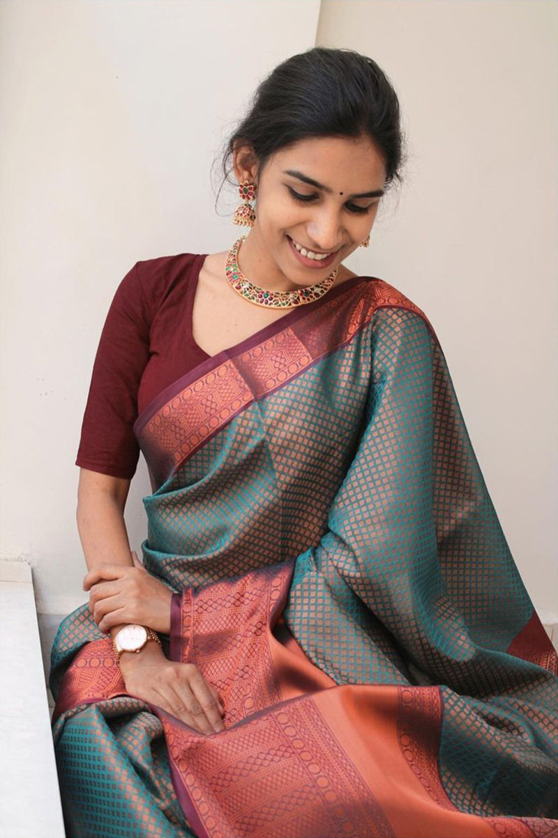 Staggering Rama Color Soft Banarasi Silk Saree With Tempting Blouse Piece