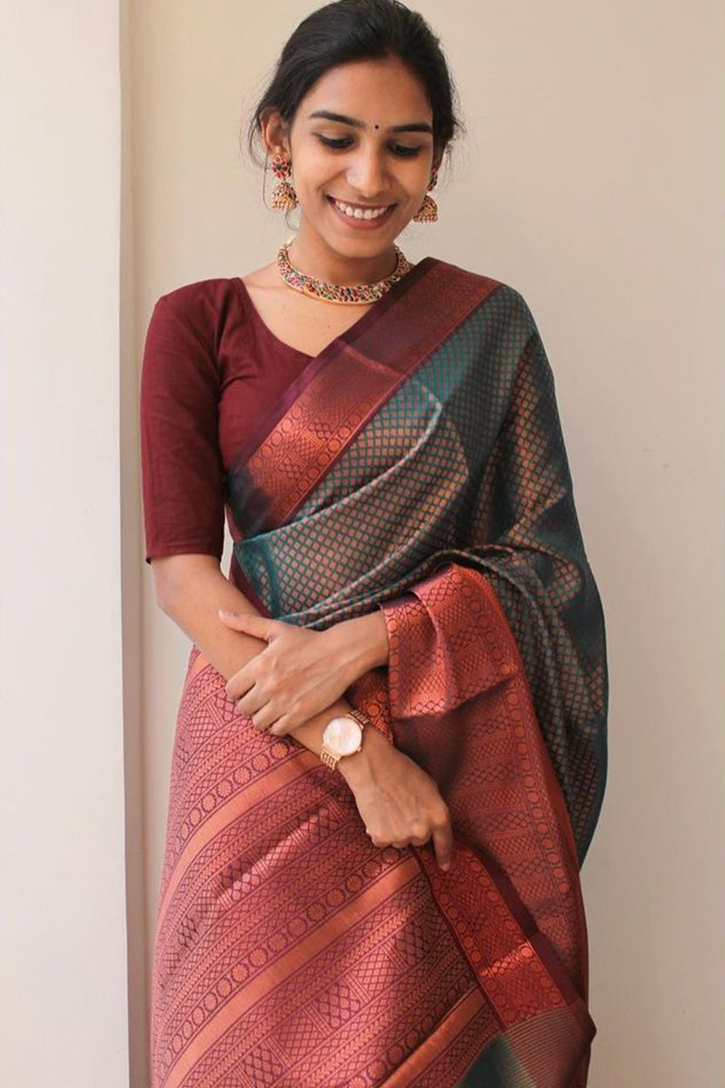 Staggering Rama Color Soft Banarasi Silk Saree With Tempting Blouse Piece