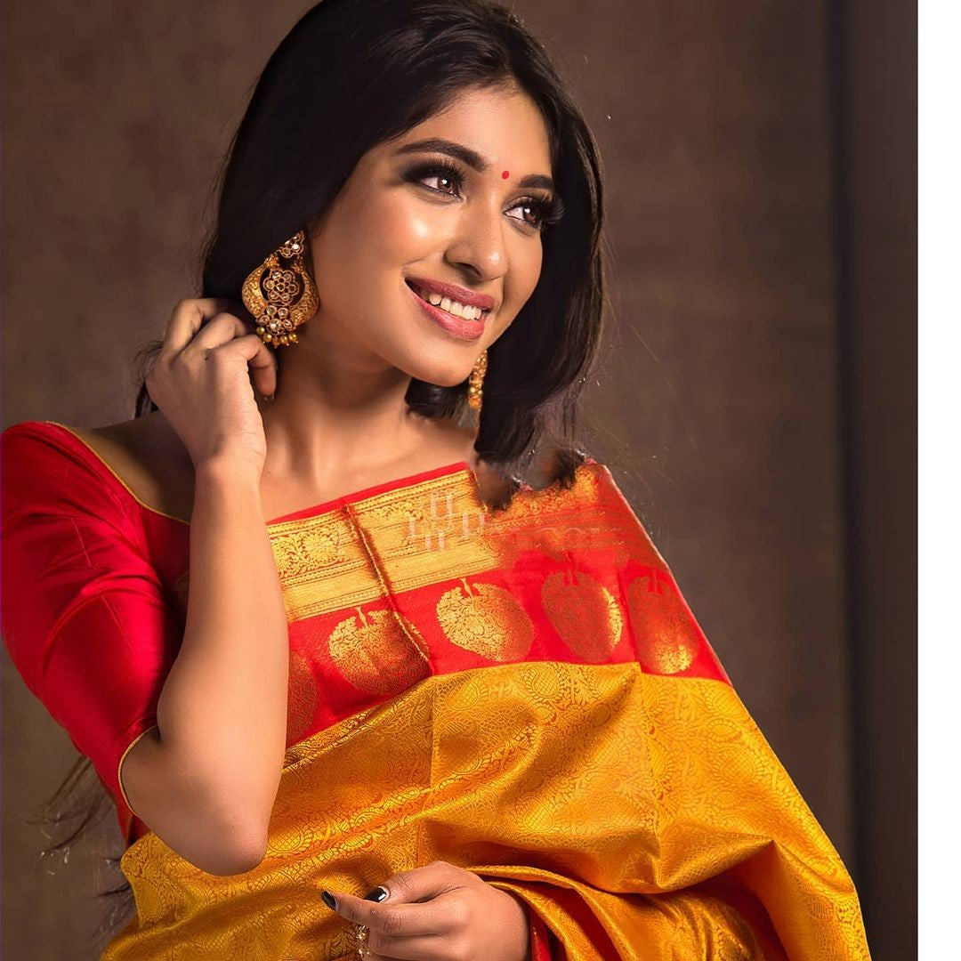 Cynosure Yellow Color Soft Silk Saree With Blouse Piece