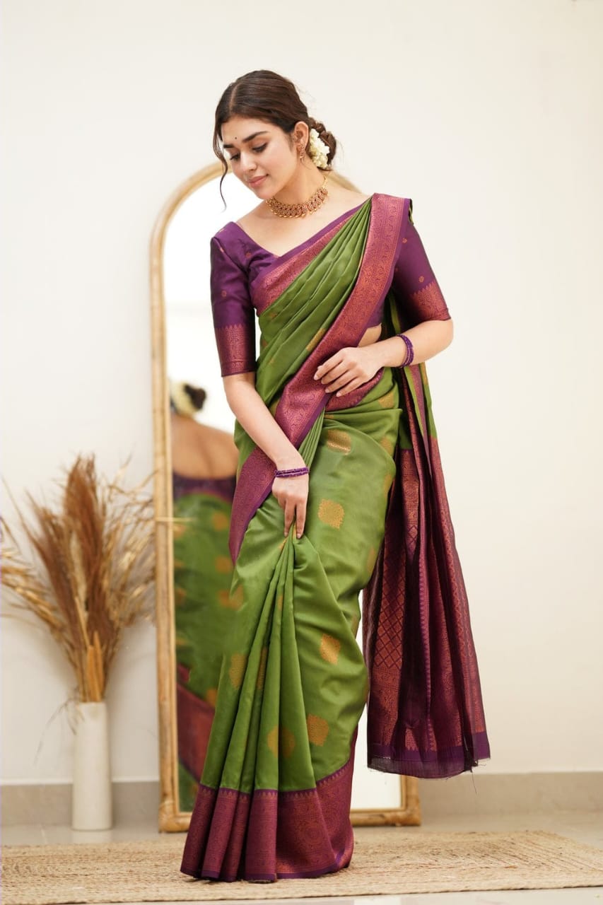 Elaborate Green Color Soft Silk Saree With Charming Blouse Piece